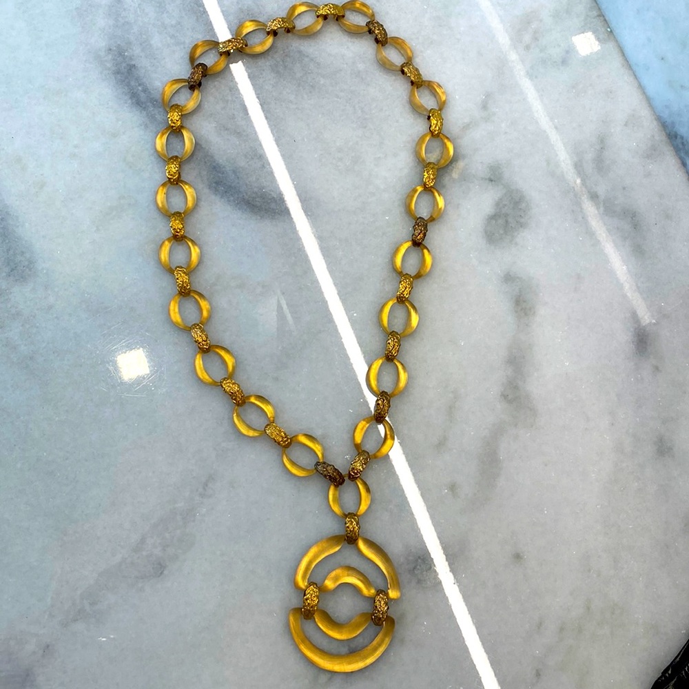 Alexis Bittar lucite and metal pendant necklace. Chic statement